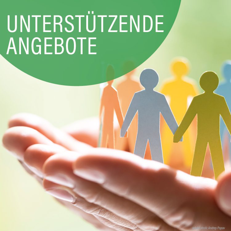 Zwei Hände halten buntgefärbe Scheerenschnitte von Menschen die einander im Kreis die Hände reichen. Mittelgrüner Kreis mit der Aufschrift Unterstützende Angebote.